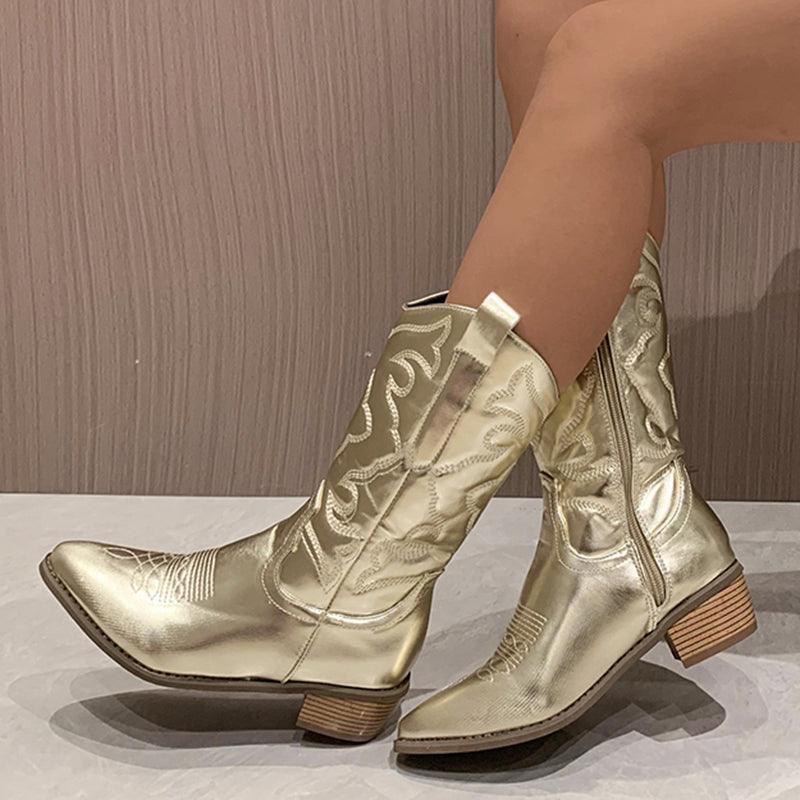 model wearing gold shiny cowgirl boots