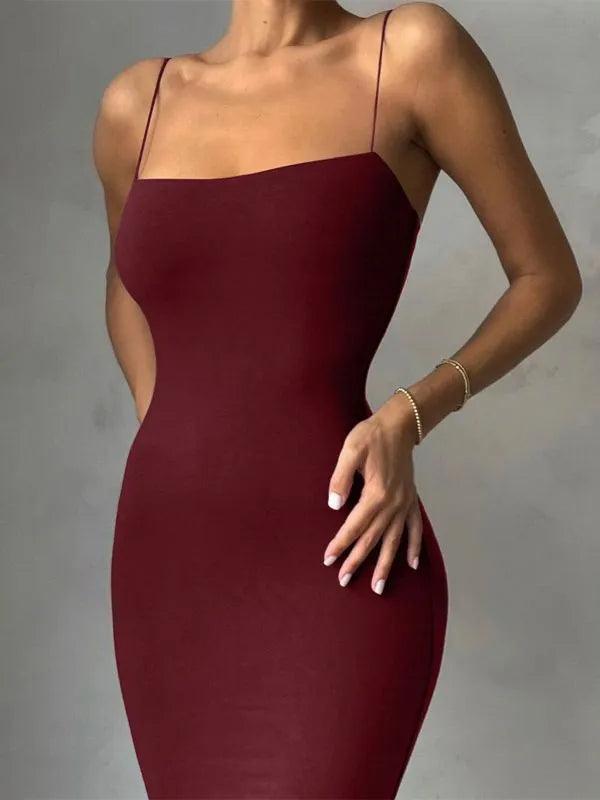 model wearing wine red bodycon maxi dress plain shadow background