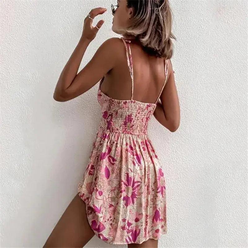 Model showing stylish dress from the back flower pink mini dress