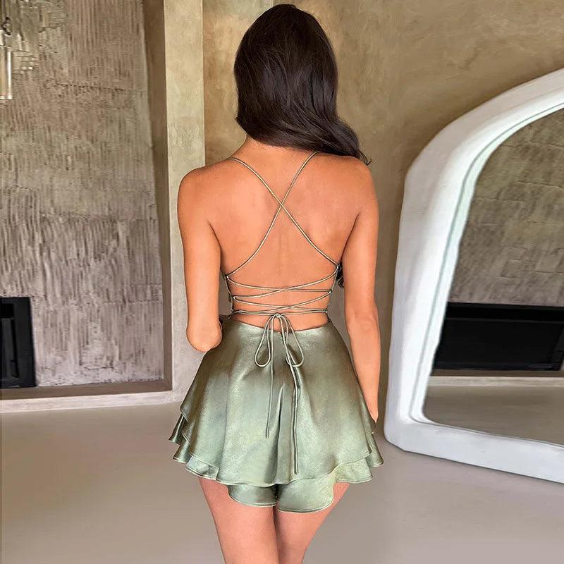 Model showing stylish olive silk mini dress back