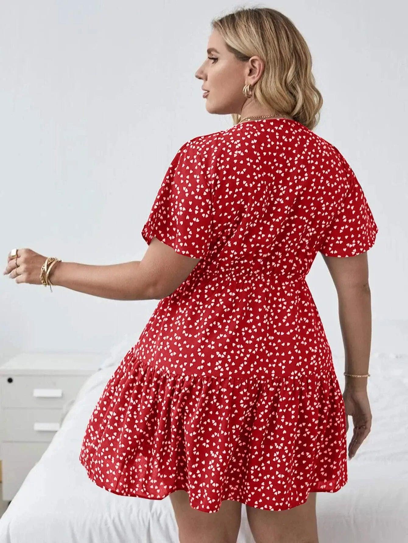 Plus-size model wearing red women's dress